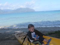 2007-01-28Sam2ndB-dayMorning  Playing in our kayak while Mommy packs up before paddling.