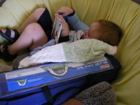 IMGP0763  Sammy reading with his tent while we pack up.