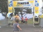 ATT00192  Sammy gets to run through a real finish line! This was up after the Lanikai triathlon.