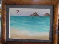 IMGP2219  A watercolor I did for mom of the islands off our beach - the Mokulua islands. She loves the kite surfers, so it seemed fitting to put one in there grabbing the last of the dusk winds. This koa wood frame was pricey, but pretty :) I haven't painted in years, but the colors here are so beautiful that I finally got motivated to try. This is combination finger painting and brush, using Sammy's water colors :)