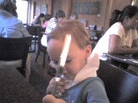 ATT01289  Sammy playing pirate on a "date" with mommy. See the sword and bandana?