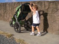 IMGP3064  This weekend he was more interested in pushing the stroller and jogging, just like mommy :)