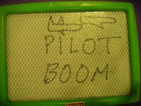IMGP4398  In-flight "preschool" lesson about the KC-10's primary mission of refueling other planes with its boom. Sam was fascinated by the boom concept and kept spelling it out, pointing to the boom operator.