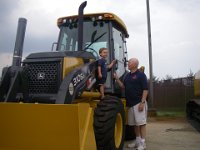 IMGP4421  An impromptu visit to the John Deere distributor turned into a private tour led by Jose. Sam got to sit in the cabs!