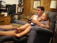 IMGP4654  Video games with "little" Richie! Sam loves this time in the man chair watching cars race.