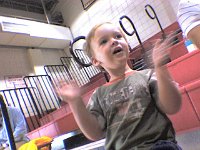 att036  Watching Stacie's volleyball game. He really liked cheering!