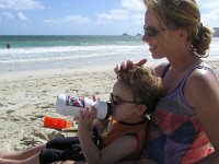 P1010130  Little buddy...hydrating before hitting the boogie board :)