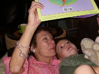 IMGP5452  Mom and Sammy reading together again. Mom laughs at this book - the words are so crazy. Sammy is learning Hawaiian and Spanish, and some Spanglish. Such a multilingual kid :)