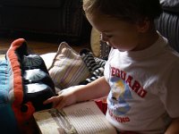 IMGP5479  Sammy is reading his "Engines" book (from the 1950's and meant for an 8th grader) to his "friends" before their naptime. Then he did prayers and sang them the mayonnaise song and tucked them in. So cute! I have a movie of all this but it's like 400 MB since it's so long. I will burn to DVD and send to the grandparents :)