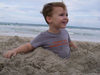 IMGP6216  Sam is enjoying burying himself in the sand lately...