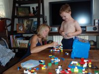 2008-05-24BenSamAngelVisit (4)  Angel and Sam making steps out of Legos. Sam makes the little Lego man walk up each step (counting each one in English, Spanish and French) then jump!