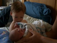 IMGP9258  Meeting Ben the first morning home as a family.
