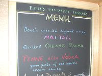 imgp9295  Dave's custom chalkboard with our menu on it. This hides the built-in desk behind it where we keep my laptop and the phone, etc.