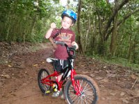 P2070001  Taking those training wheels off, big guy! Why not on a crazy, muddy trail just like the big boys! Falling is part of the whole fun!