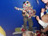 2009-03-03Children'sDiscoveryCenter (2)  Dancing with an octopus outfit! He really loves putting on a show - here you're up against a blue screen so you can see yourself on TV (where Sam is looking).