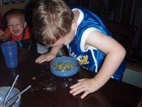 2009-03-25DoggieNite (2)  Eating like a "doggie" - spinach was another fun family food experience :)