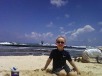 ATT00263  At the tide pools on base - a bit rough out there today but Sam and Dave snorkeled around.