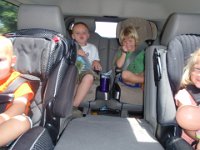 P5120003  On our way to a romp in Kathy's backyard. This is Michelle's Jeep with all the kids having a great time!