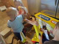 P5230020  Ben helping Aunt Angel build his ride-on toy!