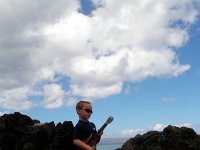 P6030247  Such a guy, playing in the lava with the waves crashing all around :) This is going to be the cover of his album some day, I see it!