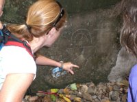 teaching jordyn  Rainbow man petroglyph. Most references consider him a symbol of a warrior, some say specifically one that protects the earth. The triangle body is closed for a man, the bottom is open for a woman (symbolizing the birth canal).