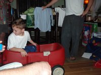 PC250168  The new wagon! They loved pulling each other around in a wagon at Richard's house, so I found a lightly used wagon on Craigslist for them. Amazing what you can find! Toys R Us was sold out, too.