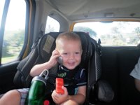 PC050017  Talking to PopPop on the phone! Poor PopPop - we have to rescue people from Ben when he gets his clutches on the phone. He just won't let go. He wanders around uttering Benglish and clings to the phone.