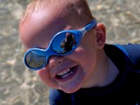 RMT4817  Richard took this awesome picture of Ben! Love that I can see Richard in the sunglasses! These shades, by the way, are the bomb. They are Julbos, they float, they are reversible (no rightside up or down), and virtually indestructible. $25 but worth it here where the sun is so strong. Believe it or not they are mountaineering grade - category III protection or some such thing!