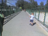 ATT00010  And Ben jogged a half mile himself! He just kept jogging and jogging after Sam (up ahead on bike). I kept asking if he wanted a ride and he would say "nope!" in his funny way. He bunches his arms up high to jog - knuckles bumping into each other as he rotates his torso side to side. I guess I'll have to video it for you :)
