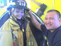 ATT01737  Look at Sam in all that gear! Thanks, Kyle!!! Ben just loved sitting up in the big driver seat. Ben LOVES to drive..."Ben drive! Ben drive! Ben drive TRUCK!"