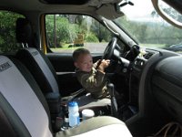 2010-03-16BenDwive  Ben loves to "drive" - screams when he is put in his back seat. Yes, we try to make his seat attractive but he's no fool :)