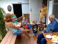 2010-04-03EddieMyrnaKamaeAtKrugs (28)  Then the DRUMS came up to the deck! Whoah! I had to use a foot to keep them from falling forward. They are a tad rickety under Sam's onslaught :)