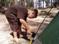 Photo0044  Now the boys and I are off on a camping trip, to celebrate Ben's birthday but really just to get off the grid and refresh our connection with each other. Sam is strong enough to bang in al the stakes now. I guess this is a tradition - taking pictures of Sam banging in the stakes. Some day I should line up all the camping stake-banging pictures to enjoy his growth into manhood :) What a big help he is.