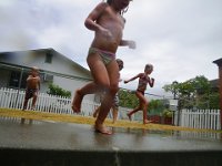IMGP2983  Then a romp in the pool - who cares if it's grey out, when kids run and play, they are warm! And we're wet anyway. With virtually no lightning or thunderstorms in Hawaii, it's safe to swim almost any time it rains.