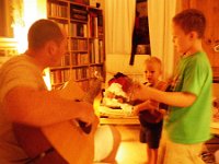 IMGP0240  They all play and sing, Sam calling out chords, or following Dad's lead.