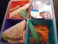 IMGP0485  Thanks to a peanut ban on campus, I have discovered the art of a bento box lunch. 4:3:2:1 carb/protein/veggie/dessert ratio. Opens up a lot of nutrition doors, I must say! Gone are the pb and j days! This particular day dessert is a sugar-free Jello snack pack. That was the envy of the other kids eating school food!