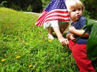 IMGP1399  Little Sam loves his flag, especially when it blows in the wind.