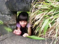 IMGP1816  Ben knocked my camera over the wall - thankfully the hill side of the wall so we could retrieve it by Joshua going through the puka! So Keani had to give it a whirl, too :)