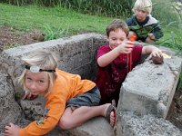 IMGP2489  The kids collected rocks on the way down that looked like dinosaur eggs, then they found this storm drain thing to jump into. Still not sure on the purpose - I was way too groggy! But it seemed like the thing to do.