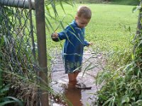 IMAG0075  Then a little walk to a large grassy field. I knew this would be a wet, mucky mess. But how can you deny boys who love it? Ooops - we have a slipper floater!