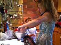 cake assembly  Cake-making process begins three days before the big day. I am on the phone with my friend Ang, from whom I've borrowed a doll skirt mold (Barbie!). I am trying to figure out how to screw it all in.