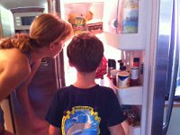 cake peeking in fridge  Peering in to see if it looks ok. Ready for Day 3 - at school!