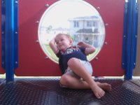 IMAG0149  Lounging at a playground and watching a little girl. He is something, isn't he?