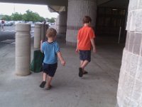 IMAG0161  Off to the commissary with two helpers! I have a new policy for Sam, who is very (VERY) full of ideas about what to buy. He peruses the aisles, reads the labels, and then presents me with options at the end of the aisle so I can have some think-time as I walk down the aisle. I don't use lists, I just use recall and improvisation. Crazy, I know. I am not a good wife.
