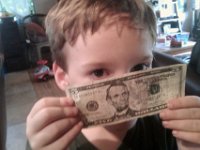 IMAG0235  Giving $5 of his own money to the Red Cross for Japan relief through a site that matched donations.