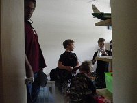 IMGP3810  Then a jam session in the boys' room after lunch. With the moving surveyors crammed in there, too!