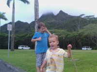 IMAG0548  A few face plants due to mud...but look at Konahuanui behind the boys. The misty clouds here make the mountains so beautiful. Listen to Wahine Ilikea.