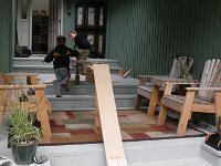 IMGP4727  Boys building elaborate bridges and ramps on the front porch. This is a neat outdoor room - such a nice place to sit with coffee or a beer and just relax, overlooking the "pen" - garden area.