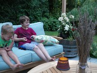 IMGP4197  Boys enjoying deck time, too. We all gather out there often, regrouping and plotting the next stage of landscaping or yard work. Dave has 2, 5, 10 and 20 year plans for this place.