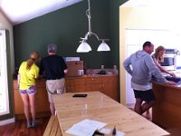 move in day 1  All at the same time we had an electrician (with me), a cabinet lady (with Dave)...